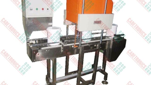 Conveyorised Lid Press
